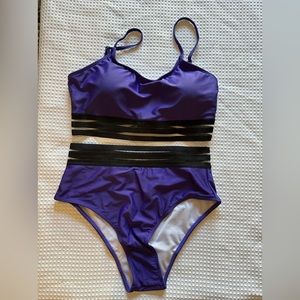 NEW. 4 for $20 🤩.Tried on but never worn. Pretty purple two piece swimsuit.